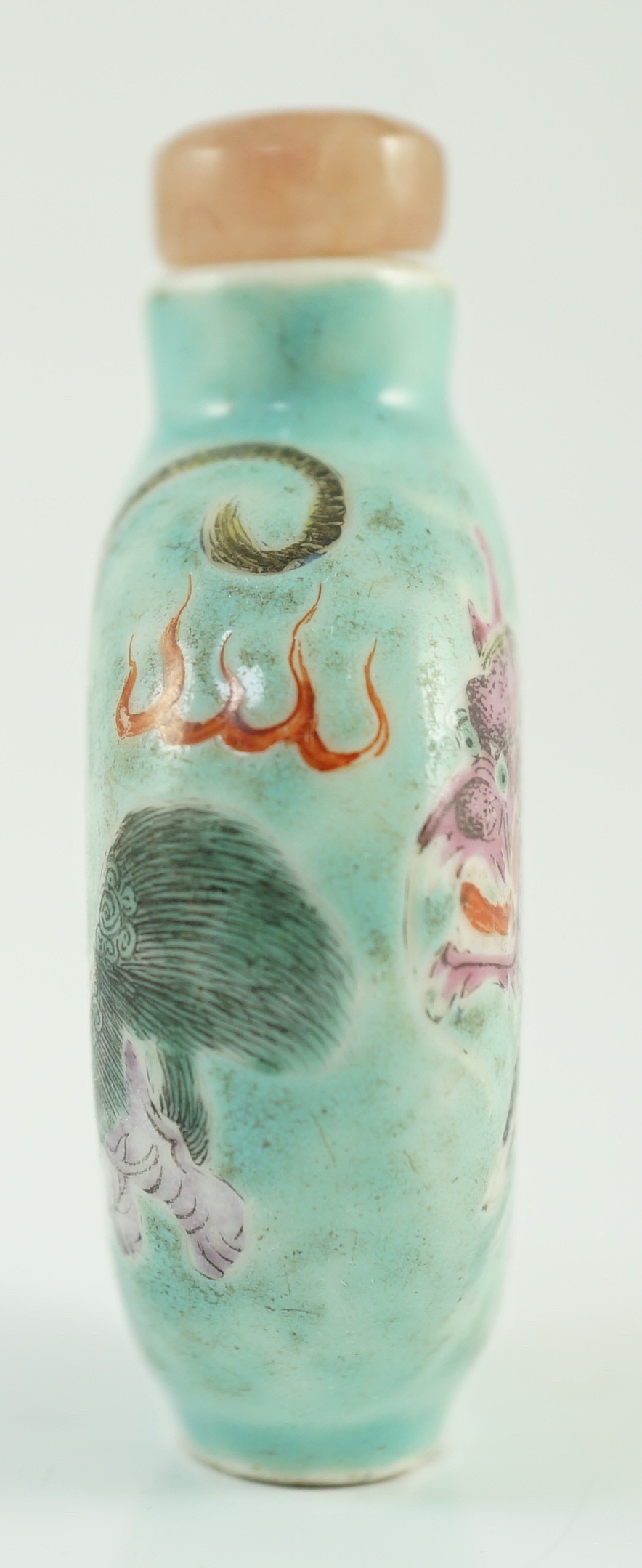 A Chinese enamelled porcelain ‘mythical beasts’ snuff bottle, 1850-1900, 5.6cm, splinter chips to foot